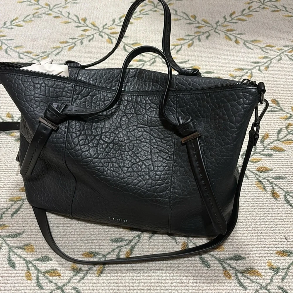Ted Baker London questions leave